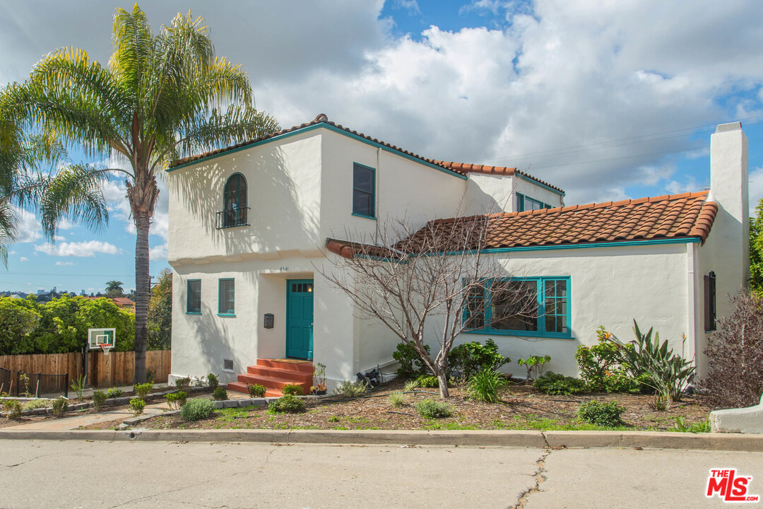 4541 Round Top Drive Los Angeles, CA 90065 - Photo 2 of 40 a front view of a house with garden