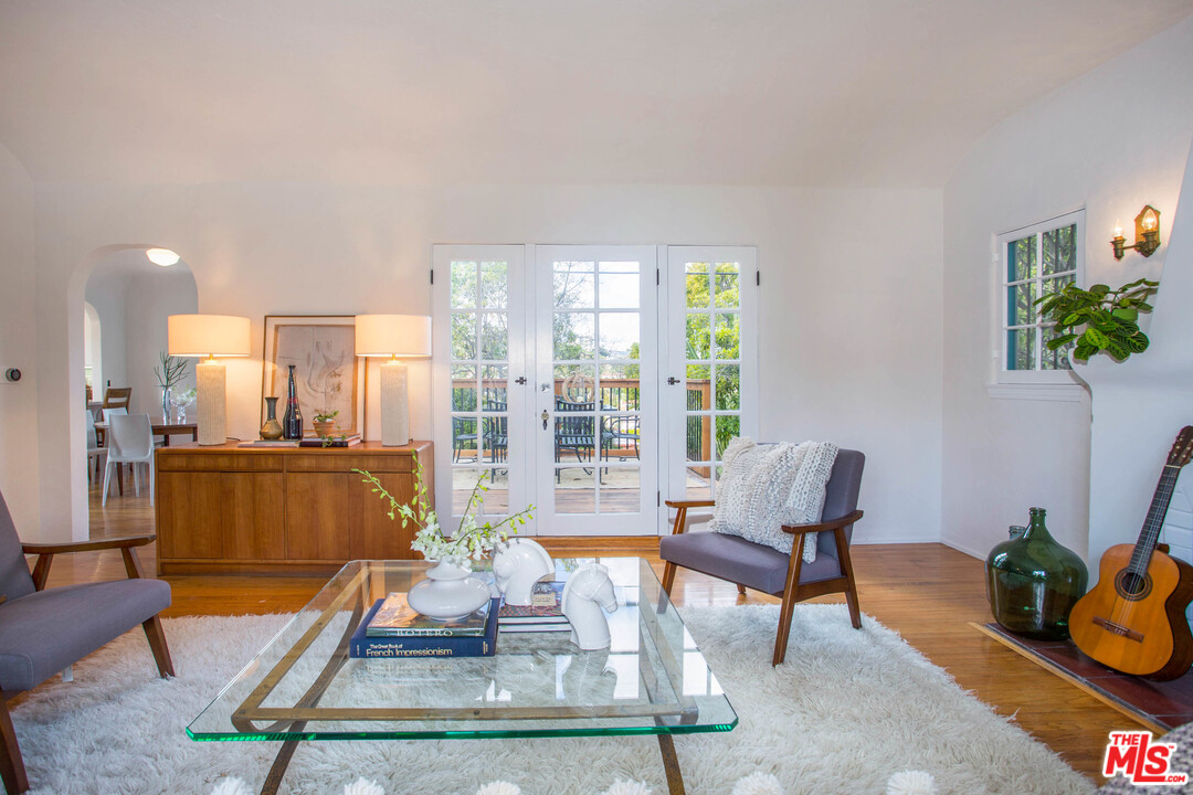4541 Round Top Drive Los Angeles, CA 90065 - Photo 7 of 40 a living room with furniture and a potted plant