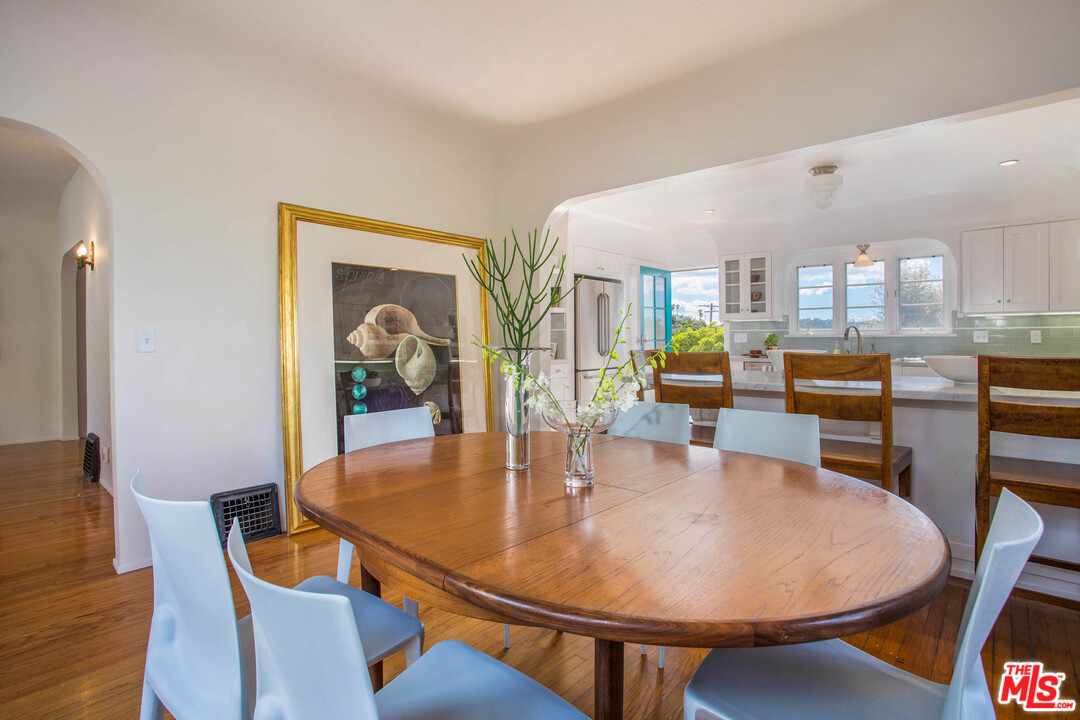 4541 Round Top Drive Los Angeles, CA 90065 - Photo 10 of 40 a dining room with furniture and wooden floor