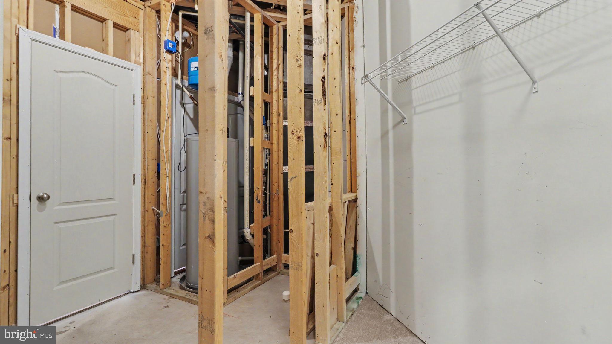 42371 Trellis Square Brambleton, VA 20148 - Photo 9 of 70 Framing in progress for future space.