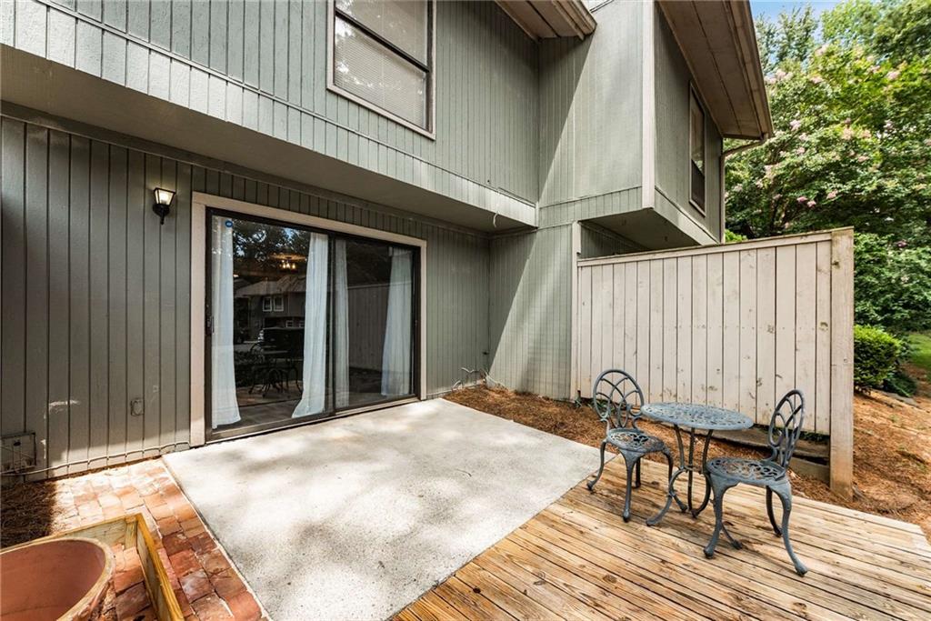 6170 Woodland Road Northwest Peachtree Corners, GA 30092 - Photo 22 of 27 a view of a two chairs in the balcony