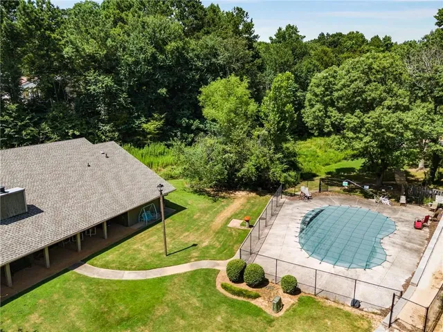 an aerial view of a house having yard