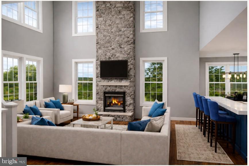2009 Floral Park Road Clinton, MD 20735 - Photo 4 of 7 a living room with furniture a fireplace and a large window