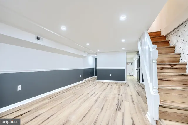 a view of a livingroom with a staircase