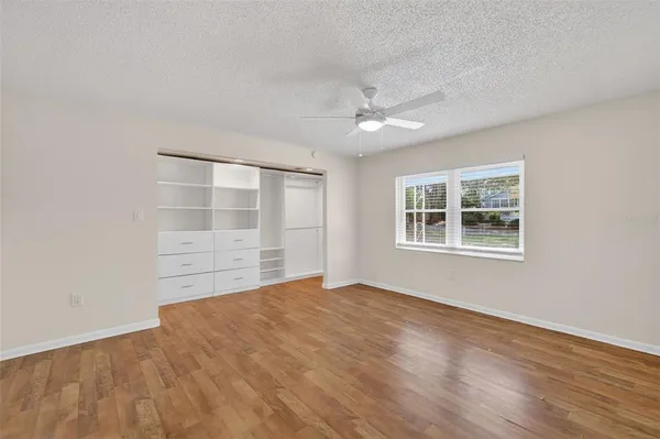 a view of an empty room with a window