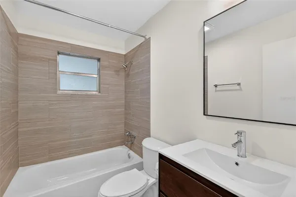 a view of a house with a large window