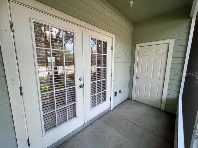 a view of empty room with windows