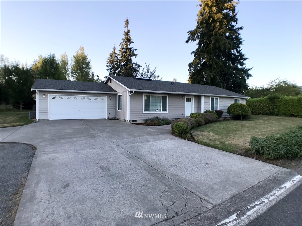 6018 Prather Road Southwest Centralia, WA 98531 - Photo 2 of 28 a view of house with a yard and potted plants