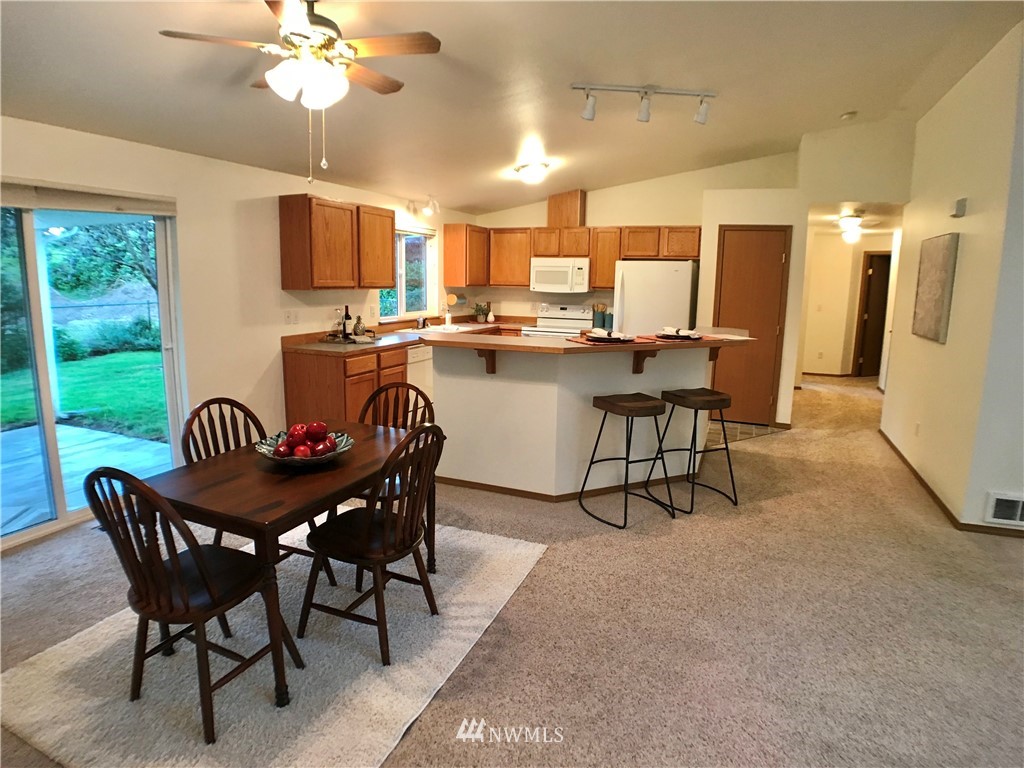 6018 Prather Road Southwest Centralia, WA 98531 - Photo 16 of 28 a dining room with furniture and window