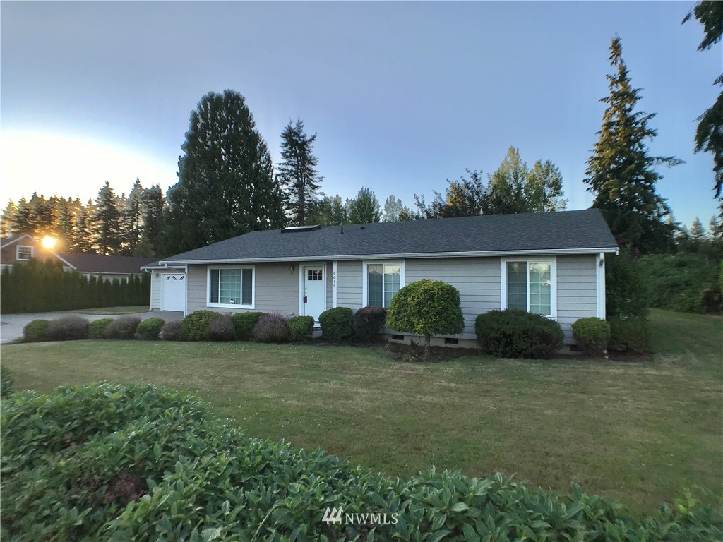 6018 Prather Road Southwest Centralia, WA 98531 - Photo 3 of 28 a view of a yard in front of a house with large tree