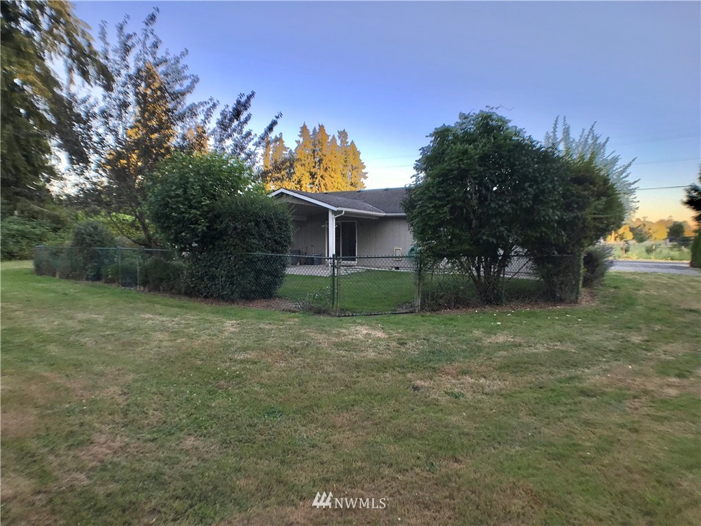 6018 Prather Road Southwest Centralia, WA 98531 - Photo 8 of 28 a view of a house with yard and a tree