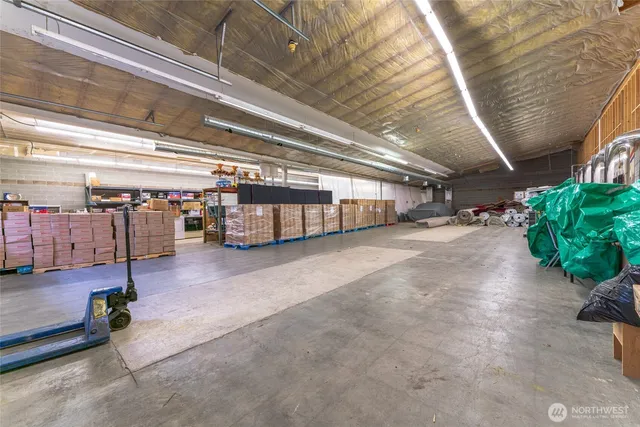 a view of a garage with gym equipment