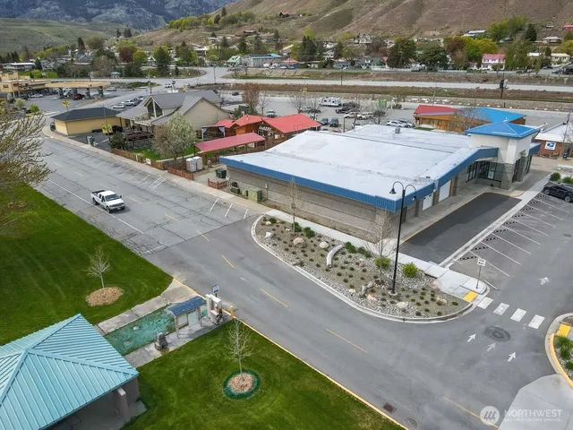 an aerial view of a chairs and table on the terrace
