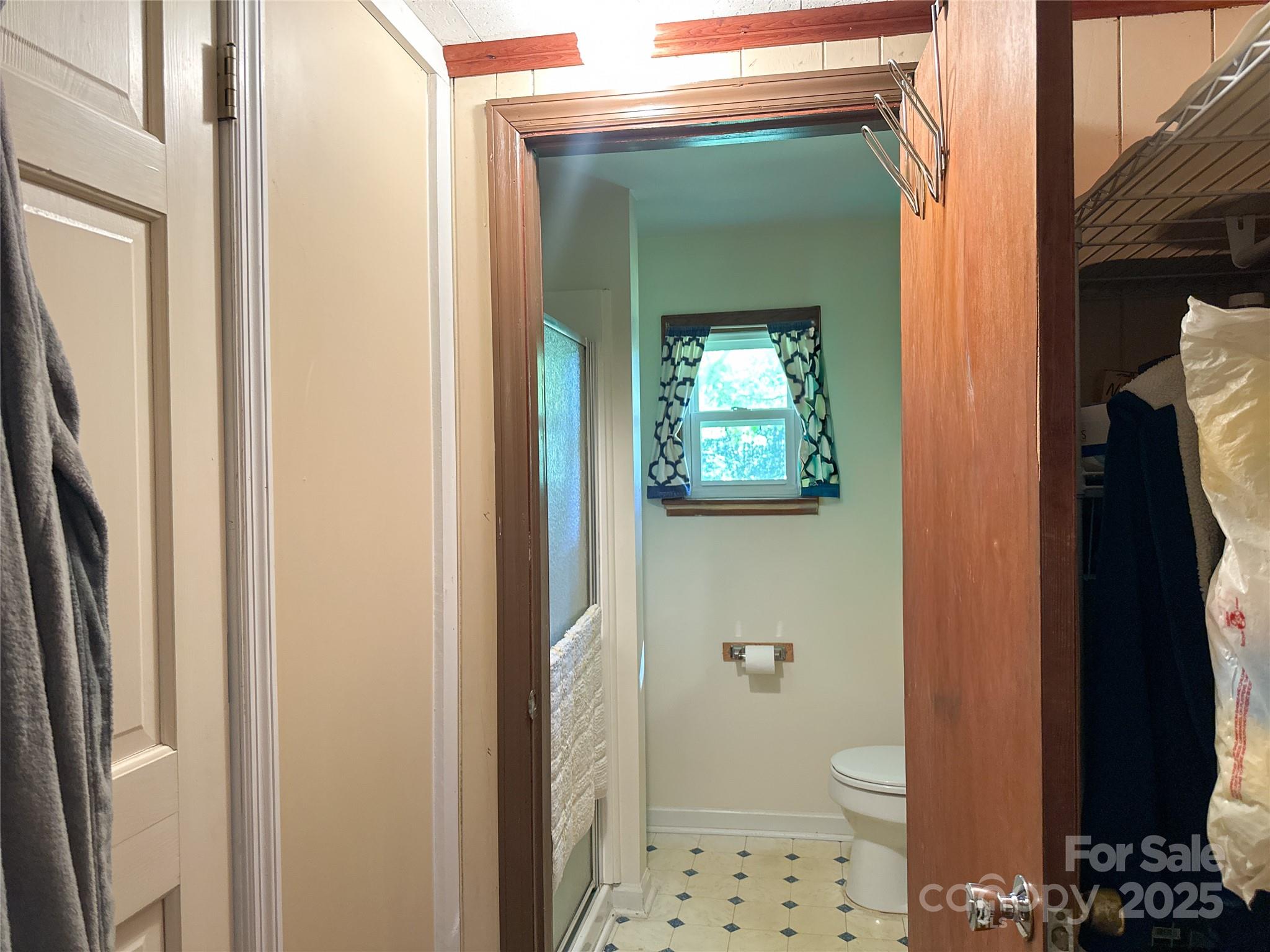 241 Canada Road Tuckasegee, NC 28783 - Photo 13 of 27 a bathroom with a sink and a mirror