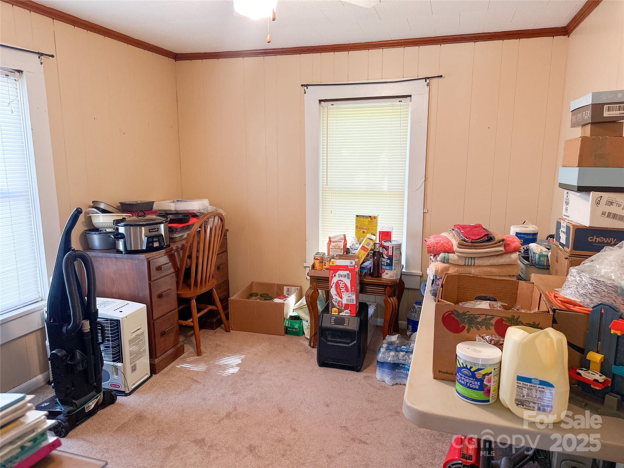 241 Canada Road Tuckasegee, NC 28783 - Photo 14 of 27 a room with furniture and a gym machine