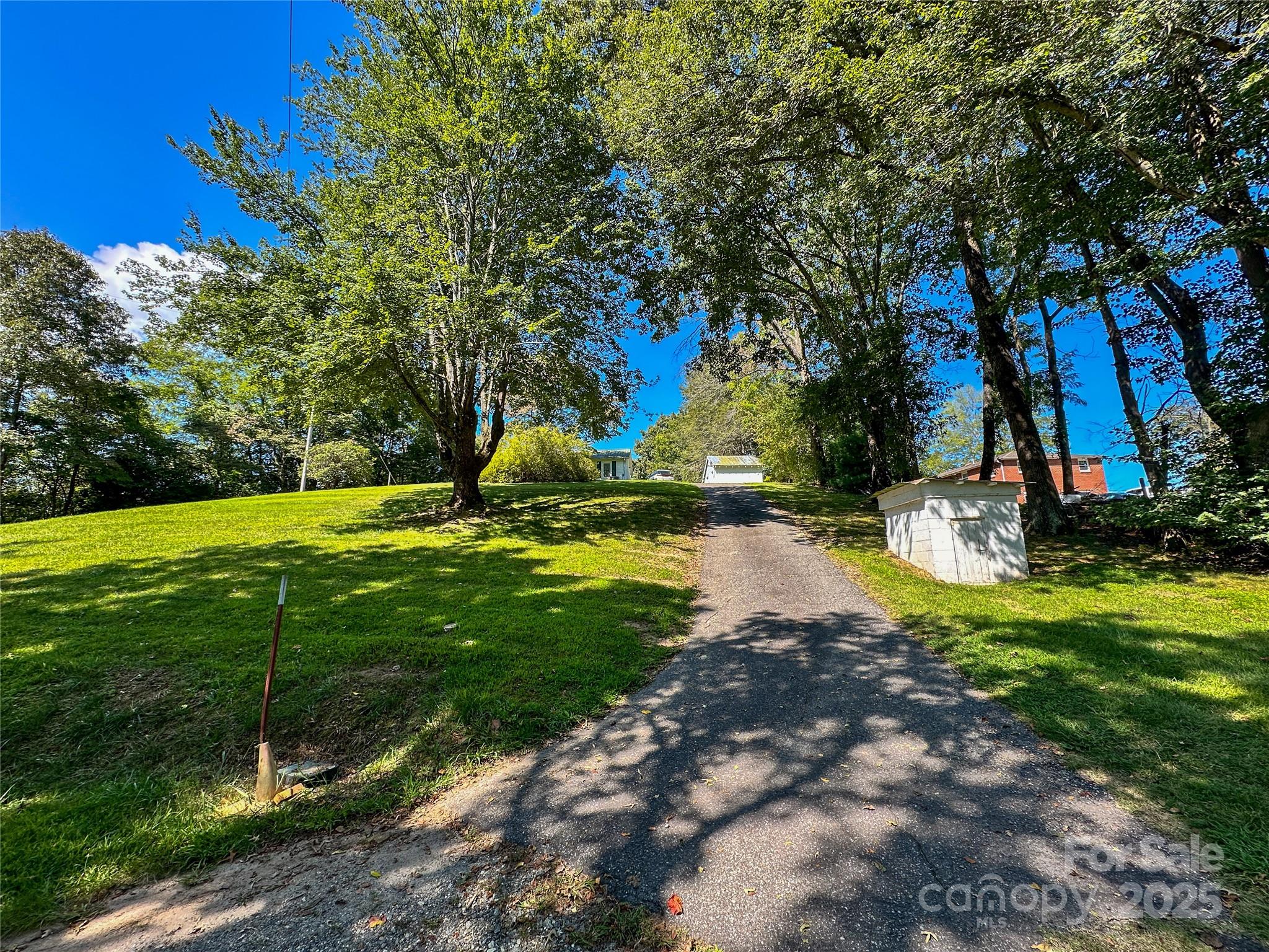 241 Canada Road Tuckasegee, NC 28783 - Photo 22 of 27 a view of swimming pool with a yard