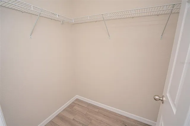 a view of a room with racks on the wall