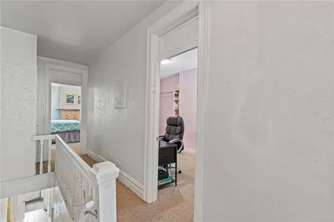 a room that has a window and a table in it