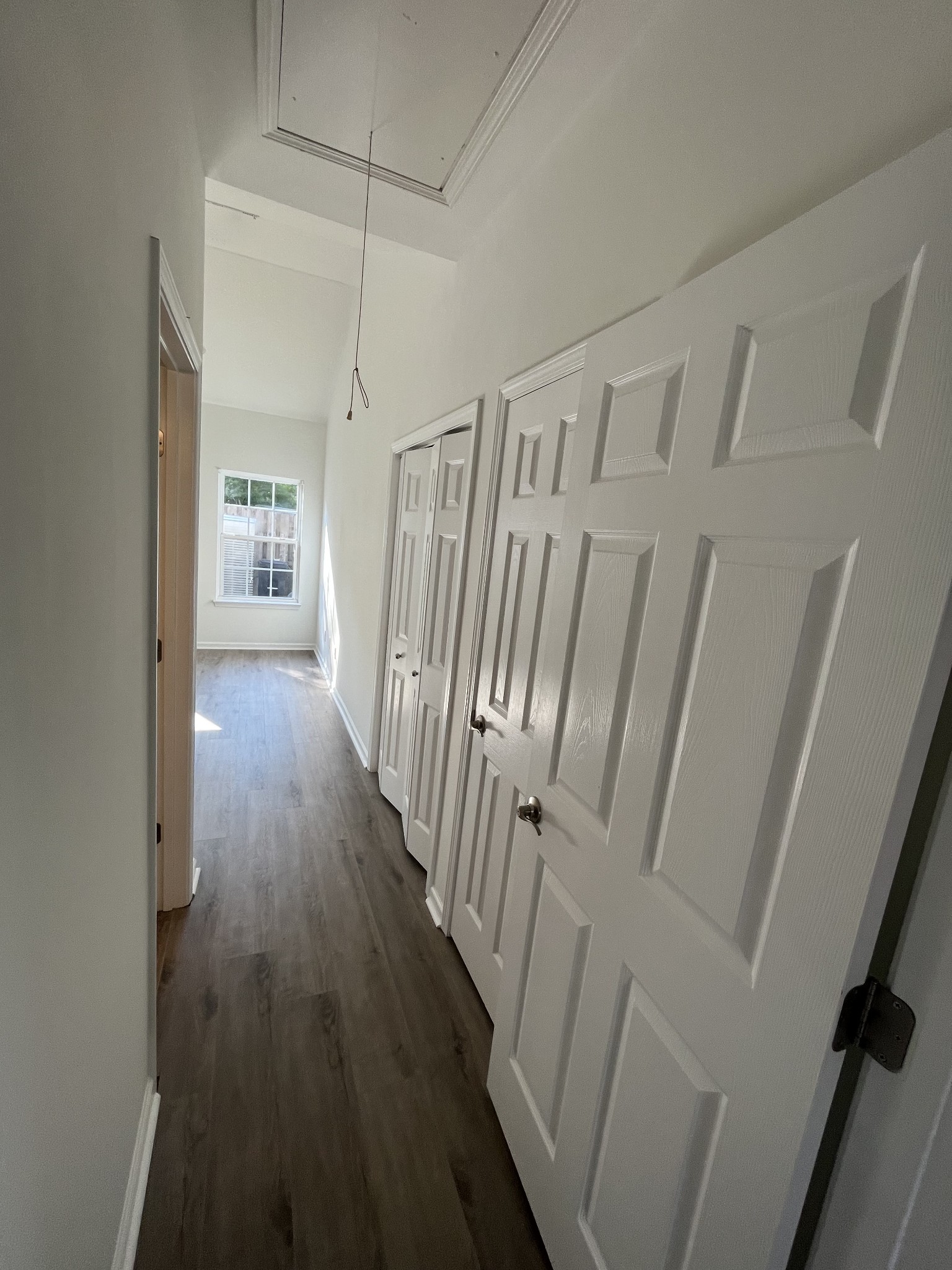 1101 Downs Boulevard, Unit 106 Franklin, TN 37064 - Photo 10 of 11 a view of a hallway with wooden floor