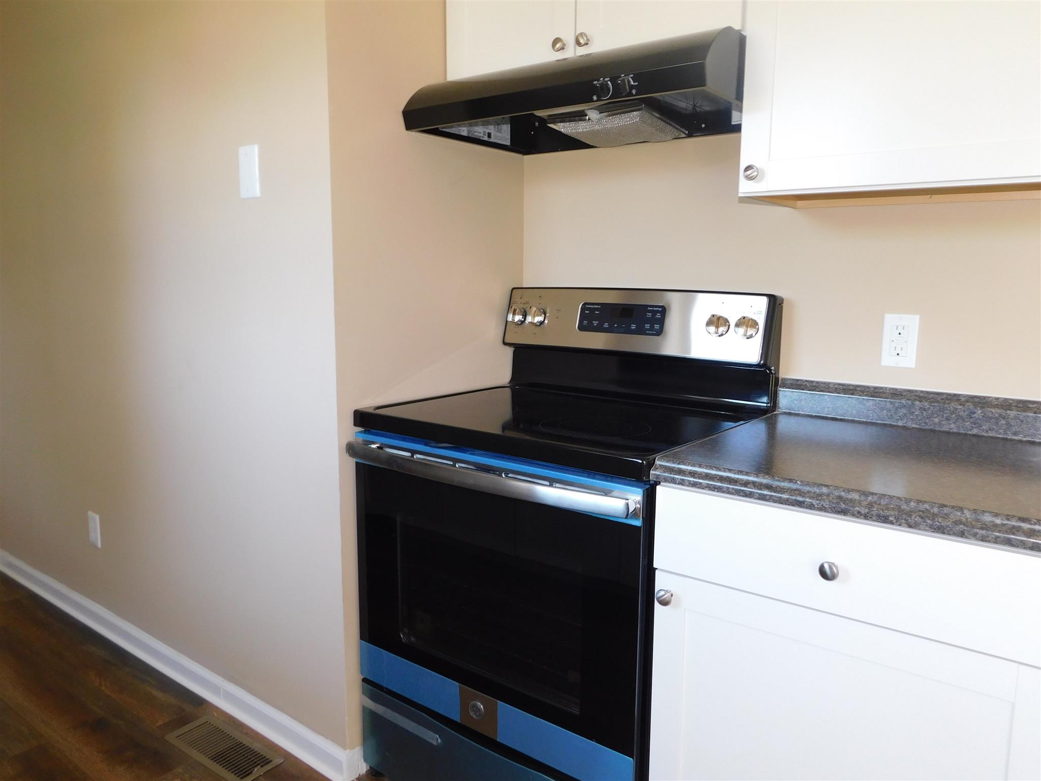 125 Rodeo Drive Columbia, TN 38401 - Photo 7 of 13 New stainless steel range and all new countertops.