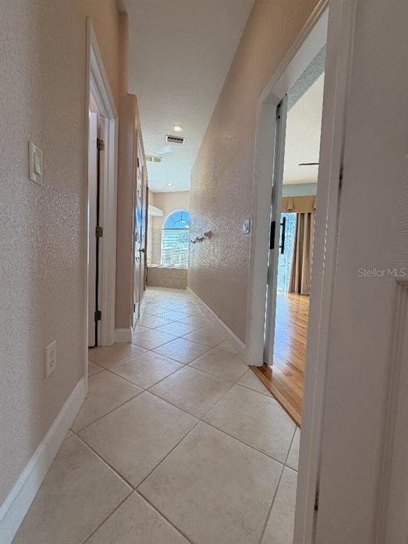 808 Symphony Isles Boulevard Apollo Beach, FL 33572 - Photo 43 of 50 a view of a hallway view with staircase