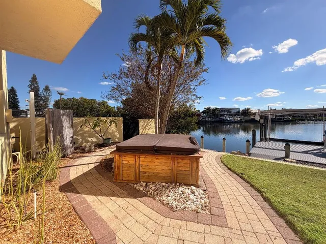 a view of a swimming pool with a lounge chairs