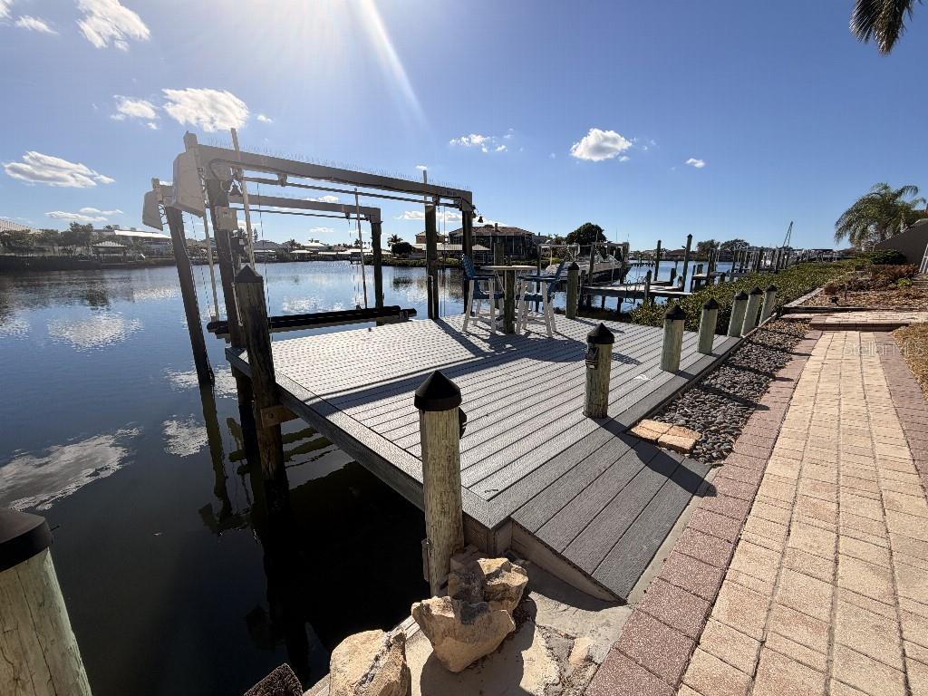 808 Symphony Isles Boulevard Apollo Beach, FL 33572 - Photo 10 of 50 a view of a balcony dining room with furniture