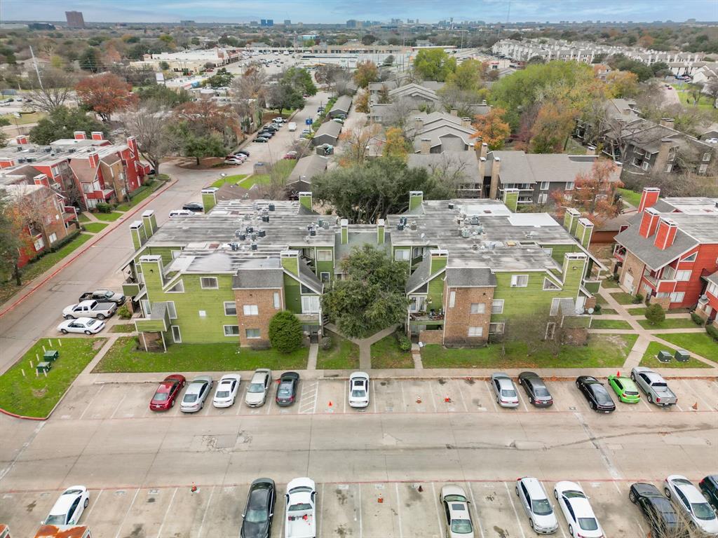 9823 Walnut Street, Unit 304 Dallas, TX 75243 - Photo 25 of 26 an aerial view of residential houses with outdoor space