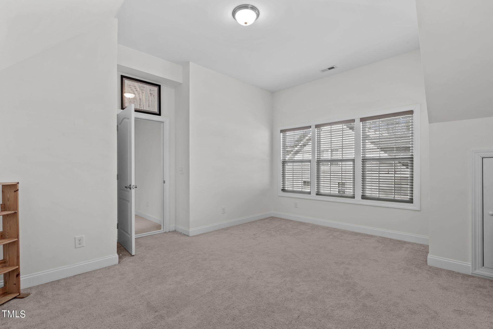 9716 Chris Drive Raleigh, NC 27603 - Photo 29 of 41 Sunny, roomy flex area to use as you please