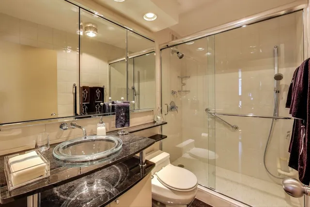 a very nice looking room with a floor to ceiling window and wooden floor