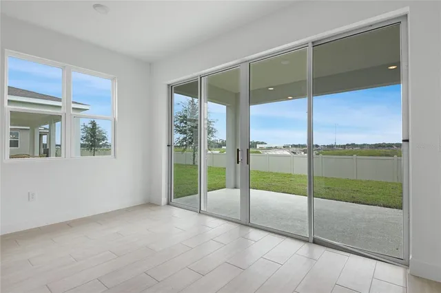 a view of an empty room and window