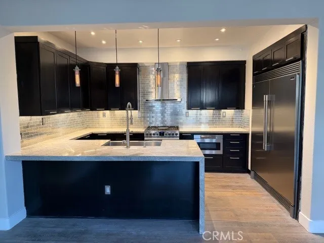 a spacious bathroom with a tub sink shower and mirror