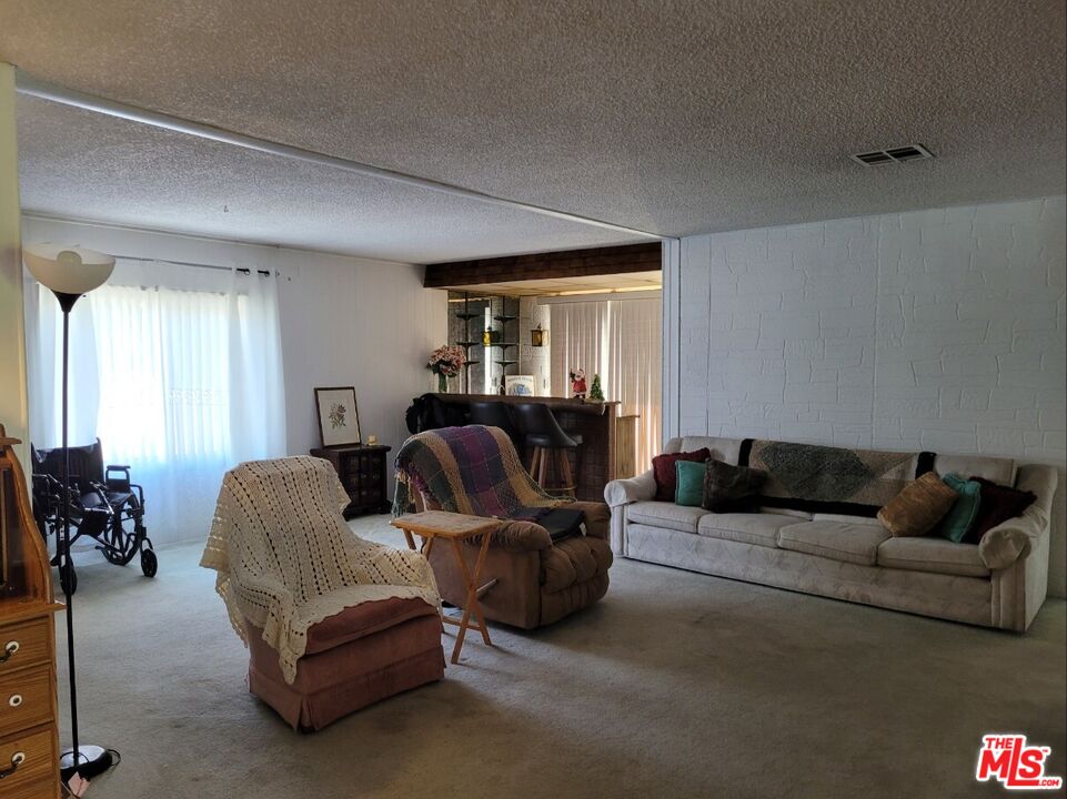17700 South Avalon Boulevard, Unit 418 Carson, CA 90746 - Photo 16 of 16 a living room with furniture