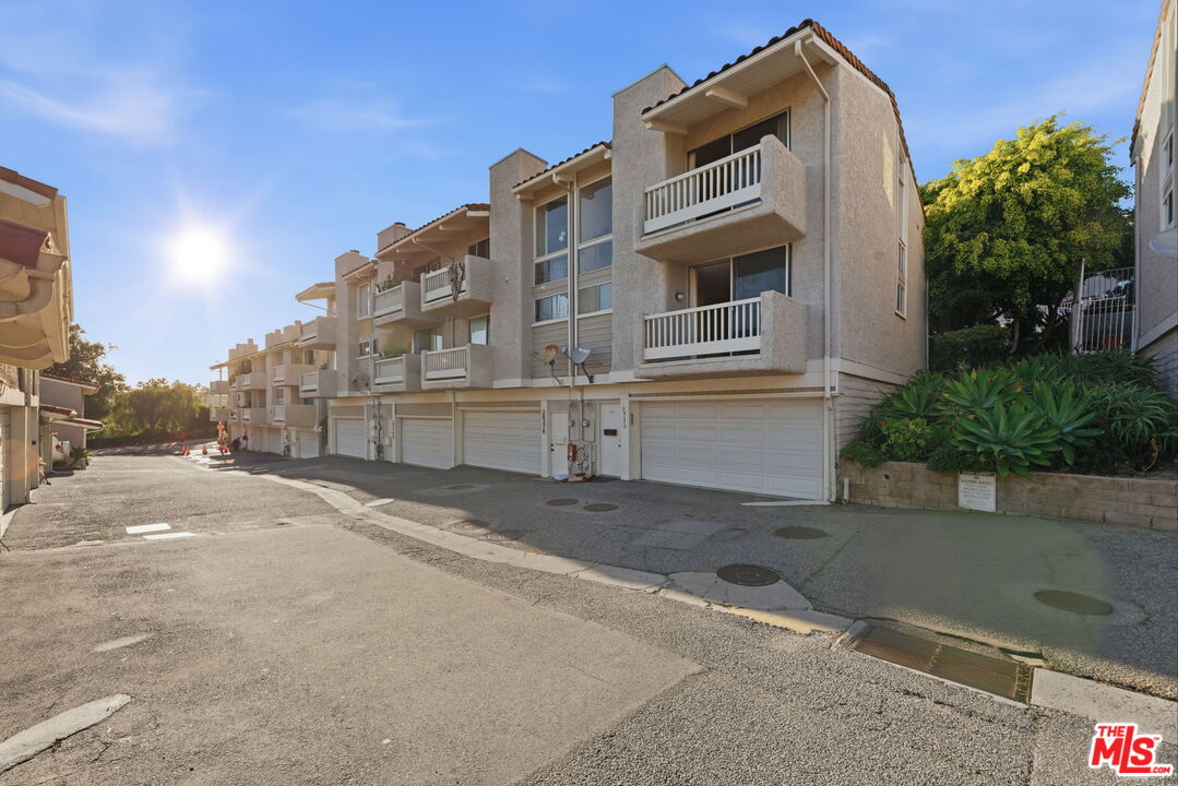 28370 Rey De Copas Lane Malibu, CA 90265 - Photo 29 of 33 a front view of a house with a yard