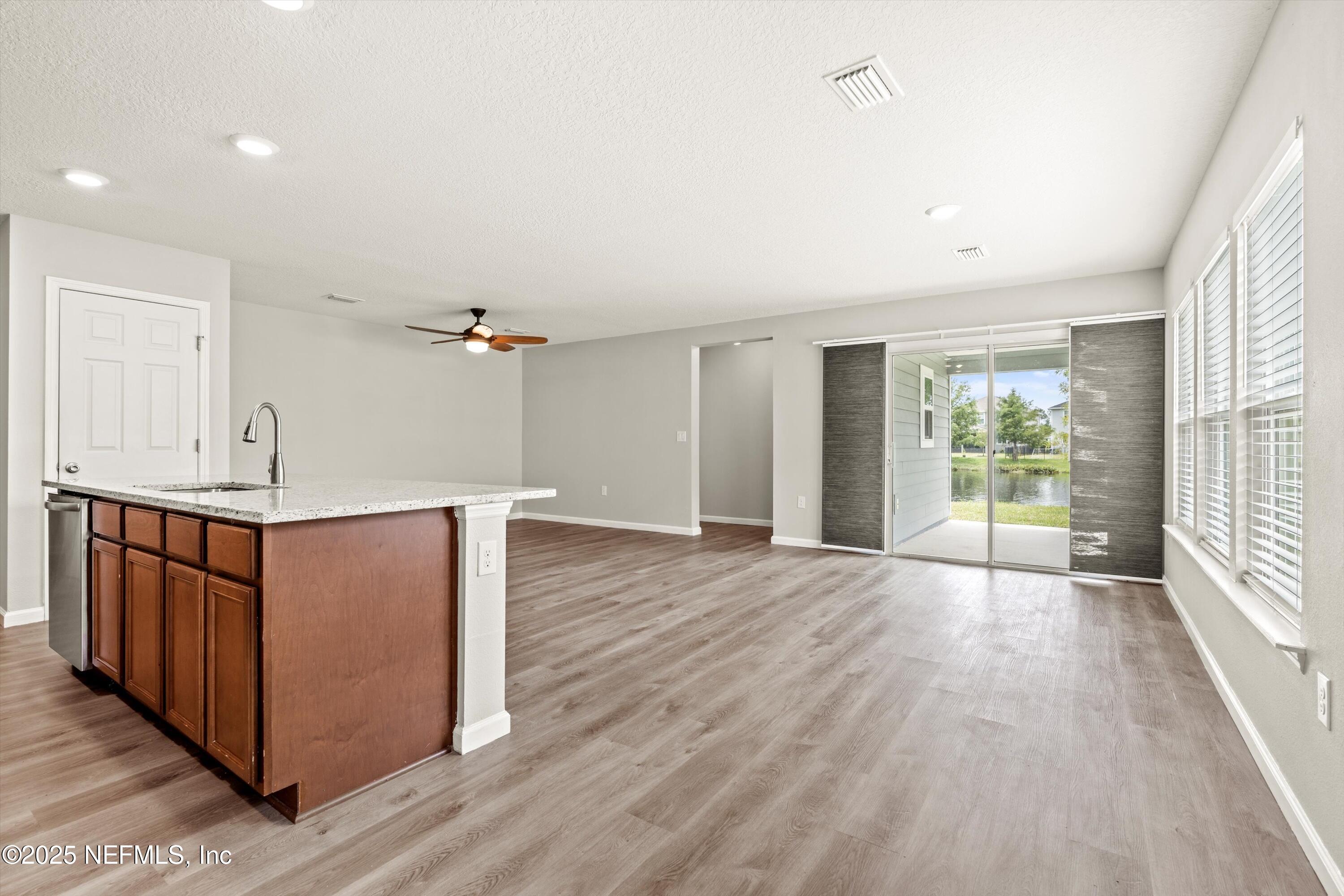 167 Fallen Oak Trail St. Augustine, FL 32095 - Photo 4 of 33 04-Kitchen & Family Room