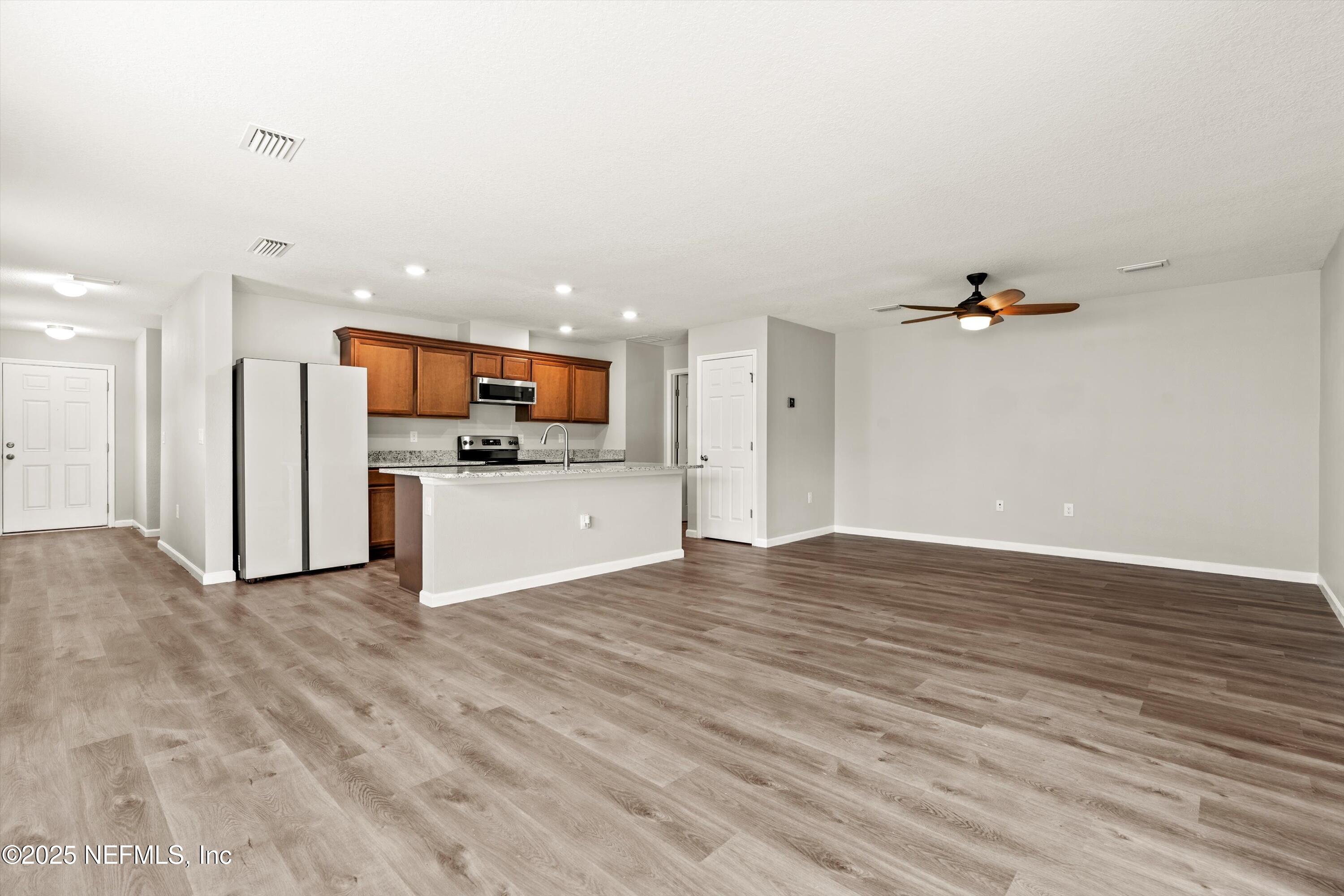 167 Fallen Oak Trail St. Augustine, FL 32095 - Photo 5 of 33 05-Family Room to Kitchen