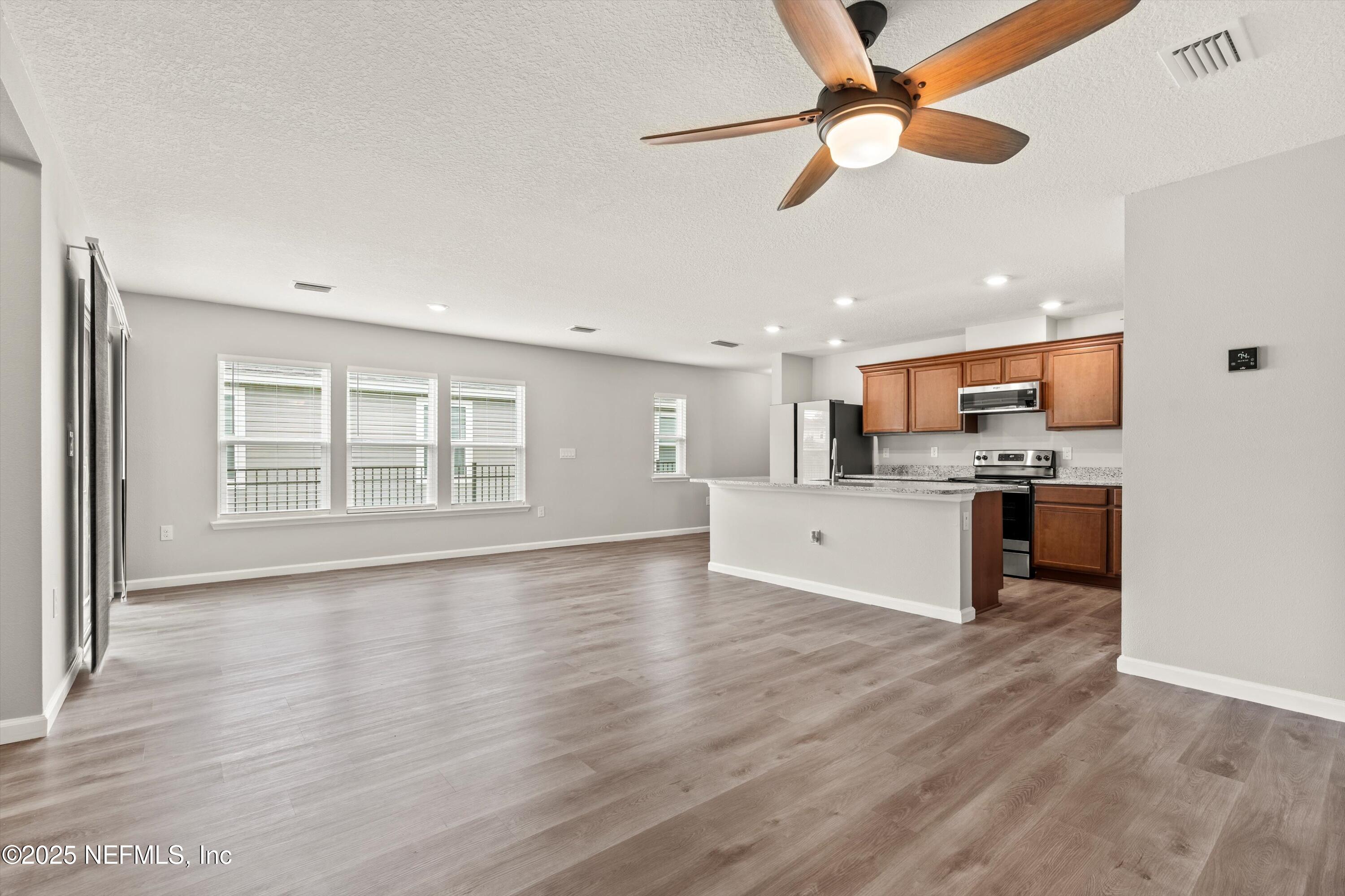 167 Fallen Oak Trail St. Augustine, FL 32095 - Photo 6 of 33 06-Living & Dining Room