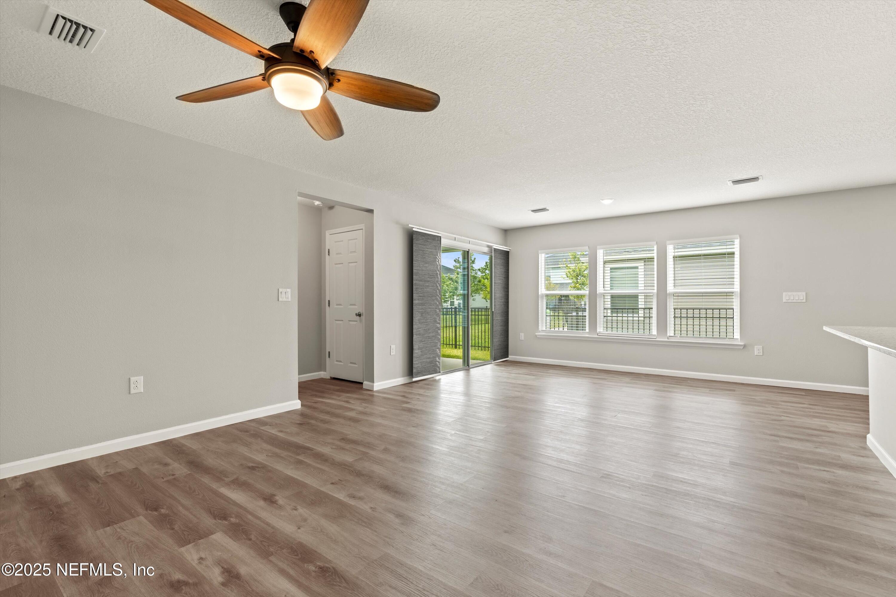 167 Fallen Oak Trail St. Augustine, FL 32095 - Photo 7 of 33 07-Dining & Living Room