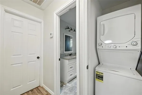 a bathroom with a toilet and a sink