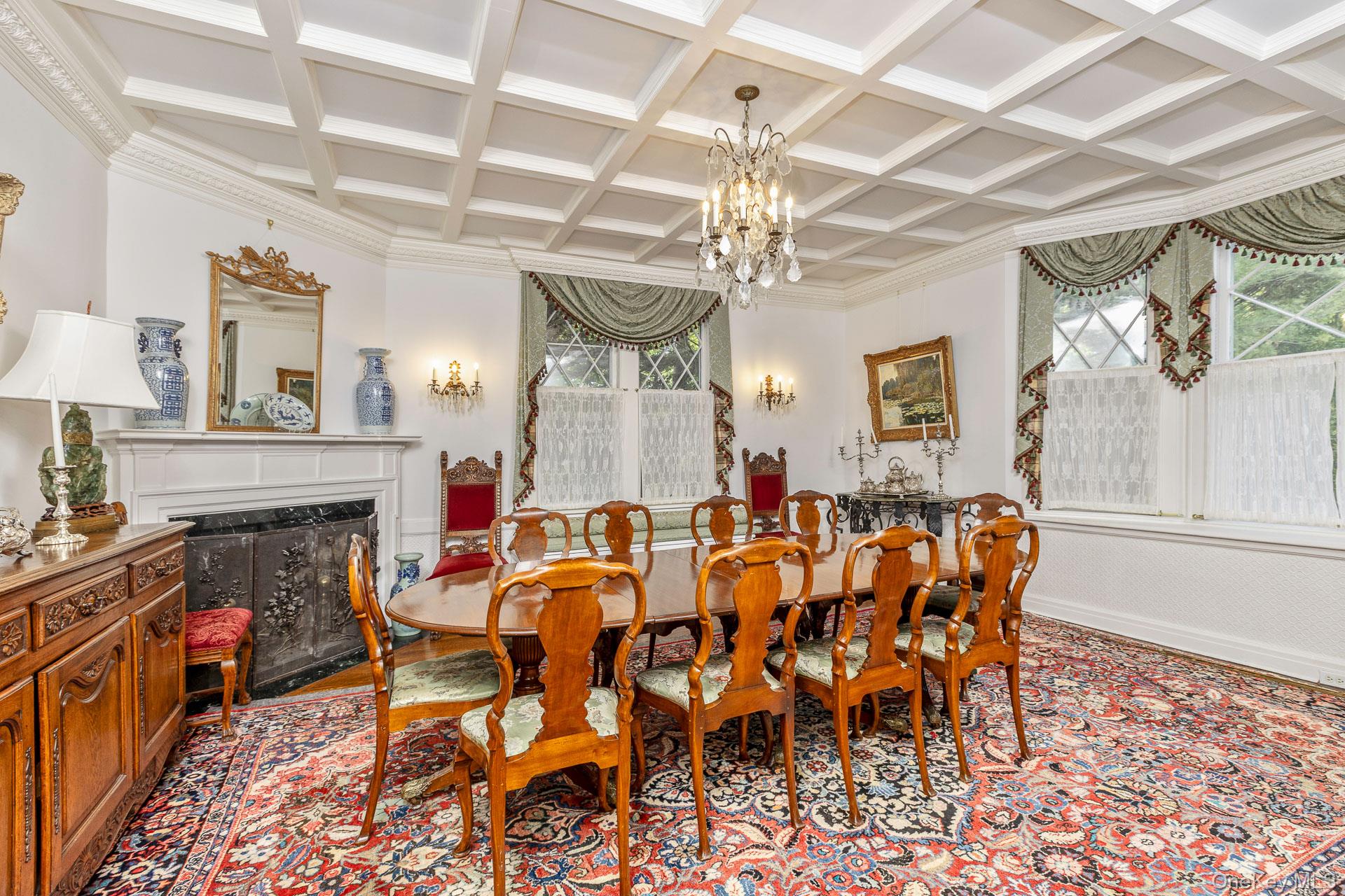 4 Horse Hollow Road Locust Valley, NY 11560 - Photo 12 of 48 a view of a dining room with furniture a chandelier and wooden floor