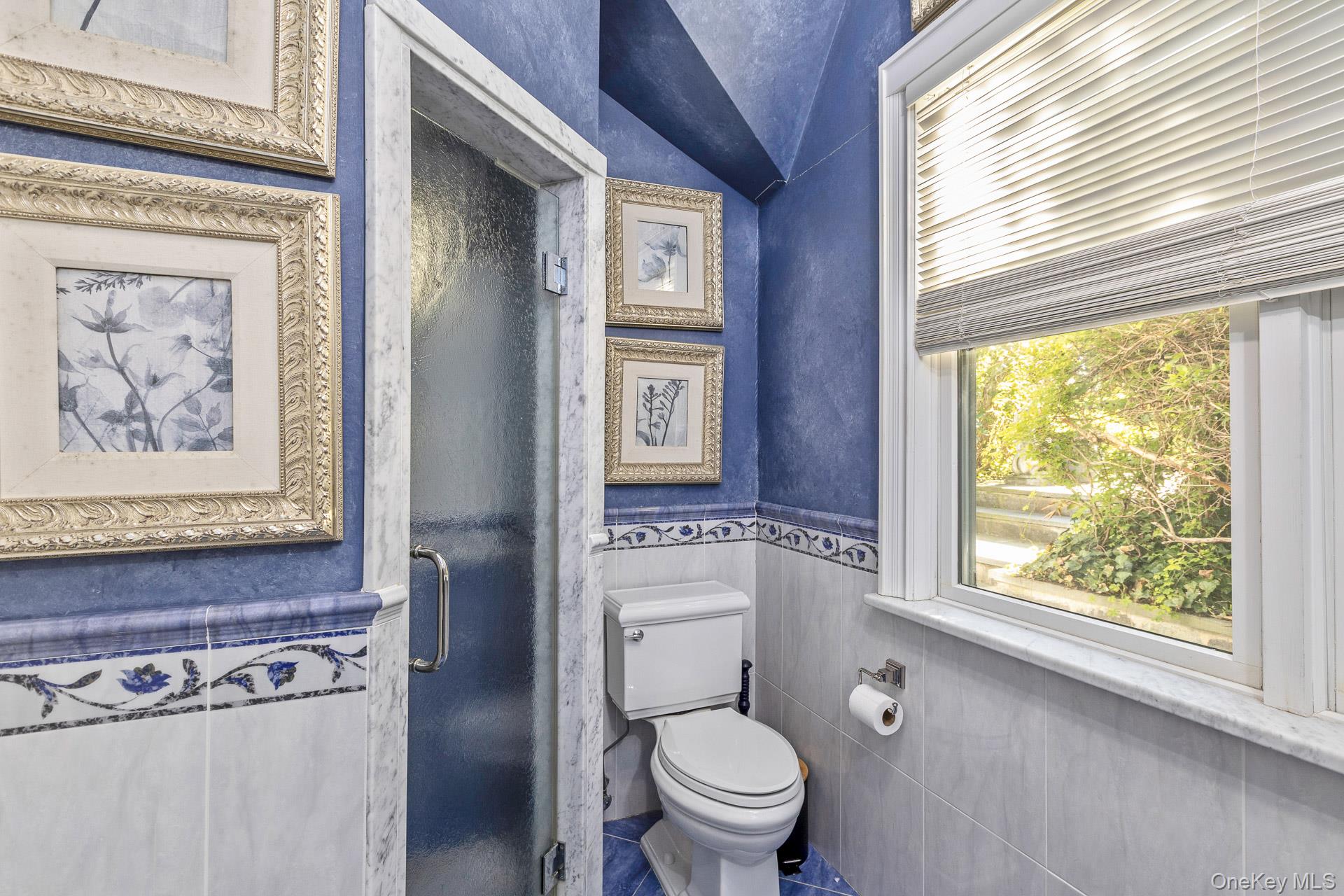 4 Horse Hollow Road Locust Valley, NY 11560 - Photo 35 of 48 a bathroom with a toilet sink and window