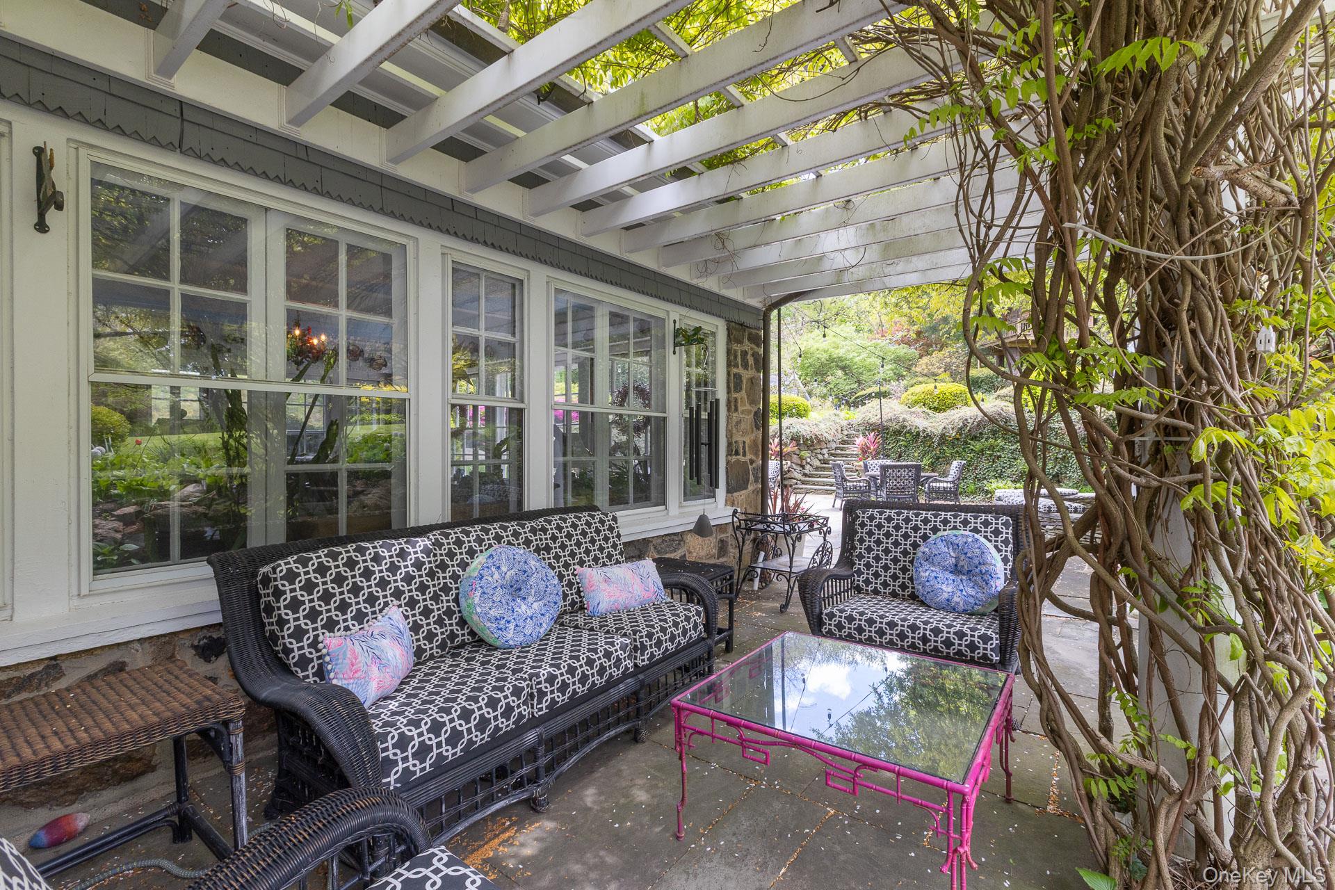 4 Horse Hollow Road Locust Valley, NY 11560 - Photo 37 of 48 a outdoor living space with furniture and garden view