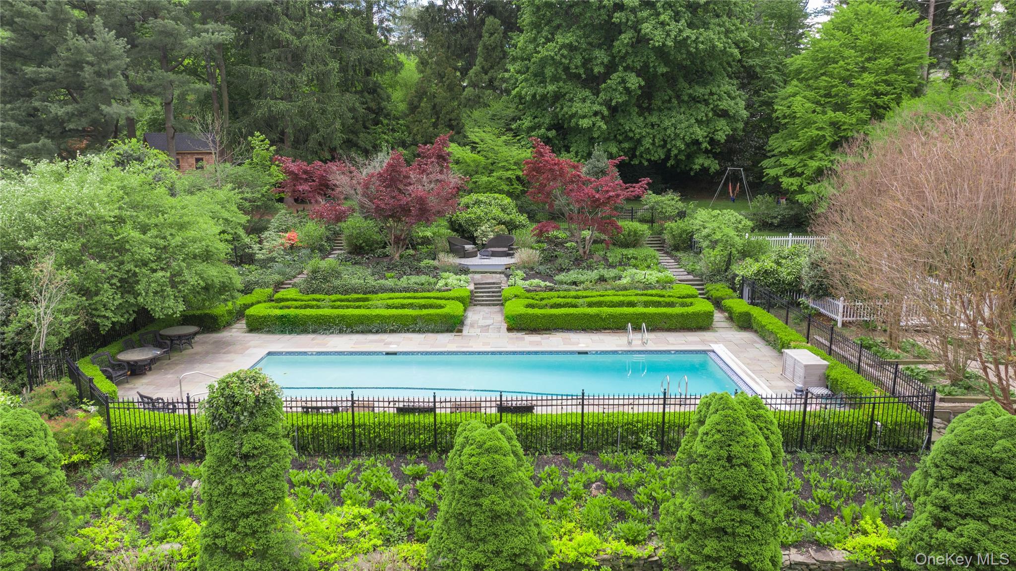 4 Horse Hollow Road Locust Valley, NY 11560 - Photo 41 of 48 a view of yard with swimming pool and green space