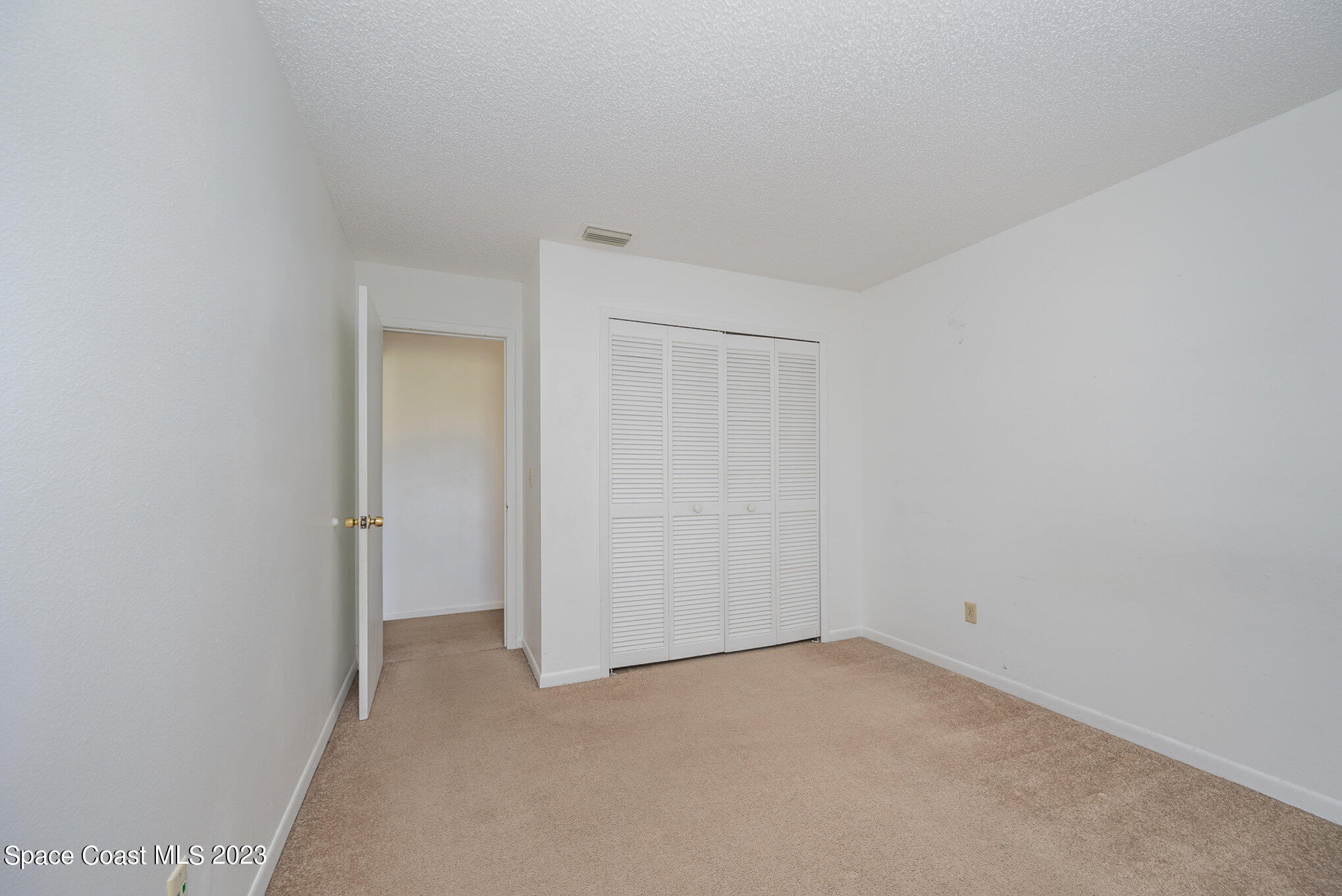 1061 Spring Street Northwest Palm Bay, FL 32907 - Photo 17 of 23 a view of an empty room