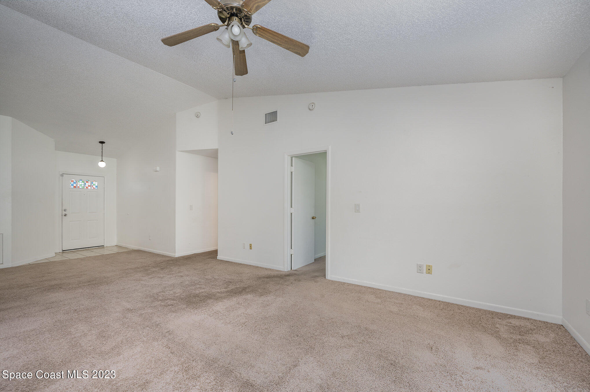 1061 Spring Street Northwest Palm Bay, FL 32907 - Photo 5 of 23 a view of an empty room