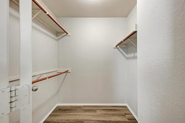 a view of a room with racks on the wall