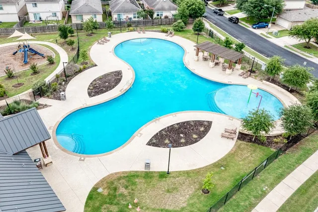 an aerial view of a swimming pool