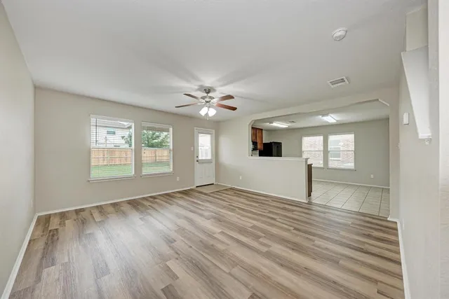 a view of an empty room and window