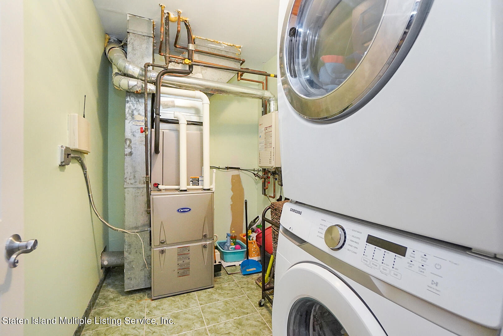 114 Commodore Drive Staten Island, NY 10309 - Photo 23 of 31 a utility room with dryer and washer