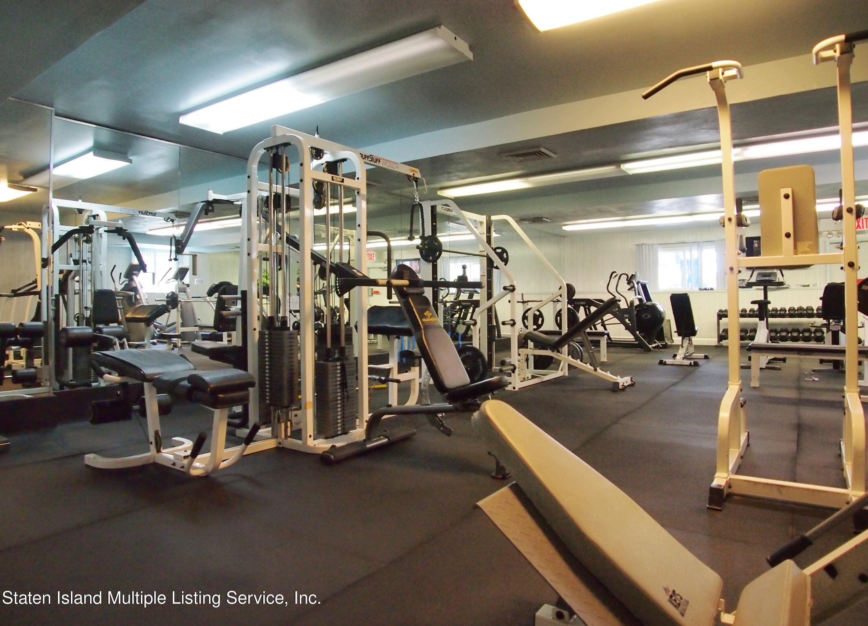 114 Commodore Drive Staten Island, NY 10309 - Photo 28 of 31 a view of a room with gym equipment
